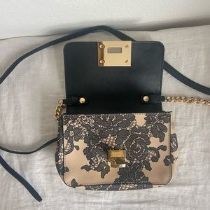 Michael Kors tan and black floral purse with gold chain strap, Crossbody